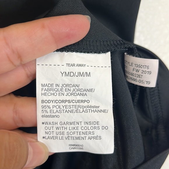 Under Armour HeatGear Loose Youth Medium Black performance Polo - Picture 5 of 7